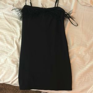 black slip on dress with feathers